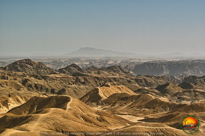 Shore Excursion - Flamingos ,Dune7,Welwitschia, Moonlandscape,Oasis,Swakopmund. - Swakopmund gives the day a town finish