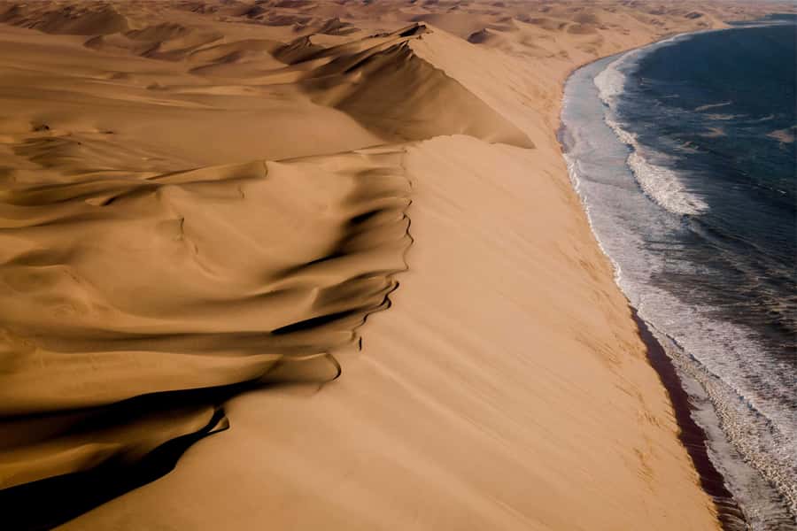Walvis Bay and Sandwich Harbour Tour - Beach driving toward the national park