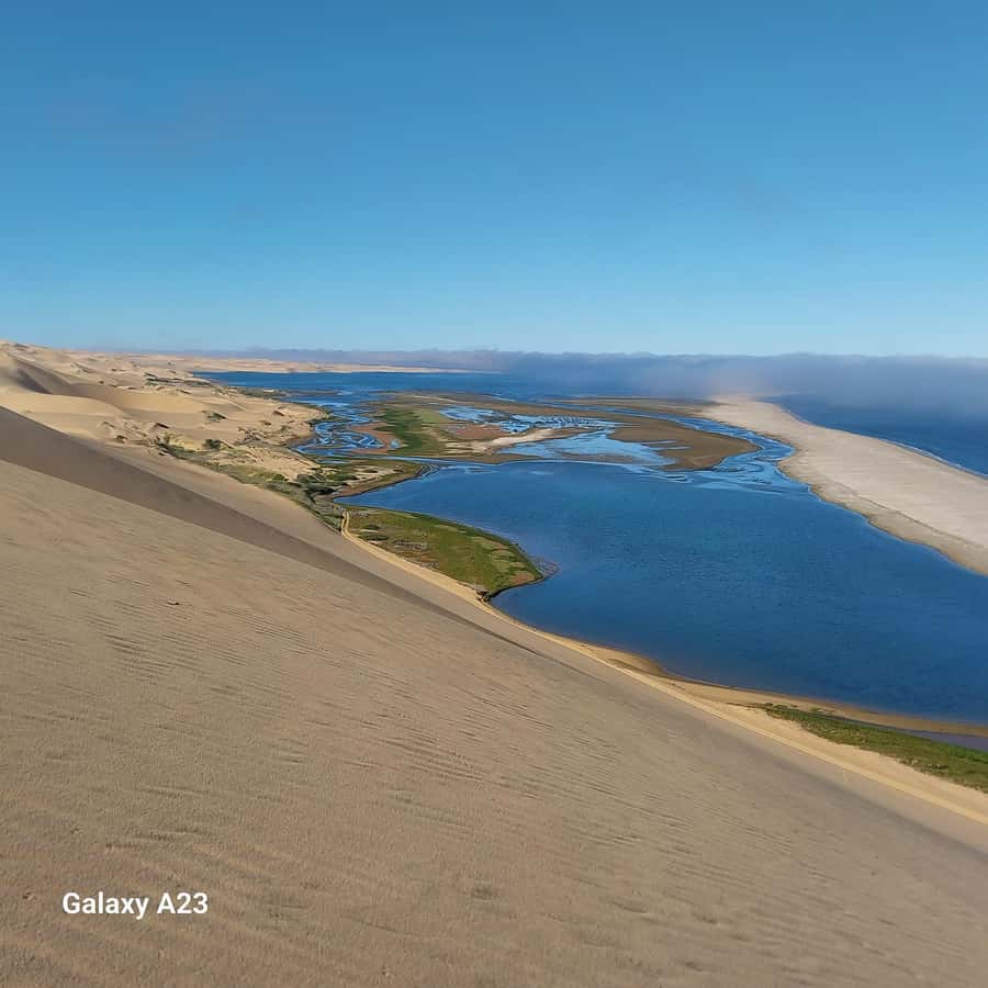 Walvis Bay: Pelican Point Seal and Sandwich Harbour Tour - The return route through salt pans