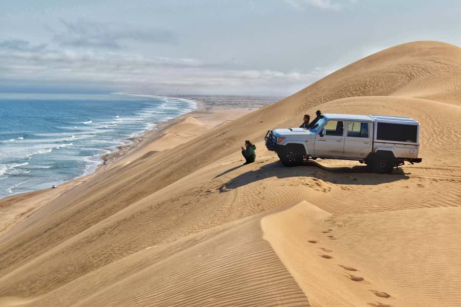 Walvis Bay: Sandwich Harbour Half-Day 4x4 Scenic Excursion - Sandwich Harbour, a wetland behind the dunes